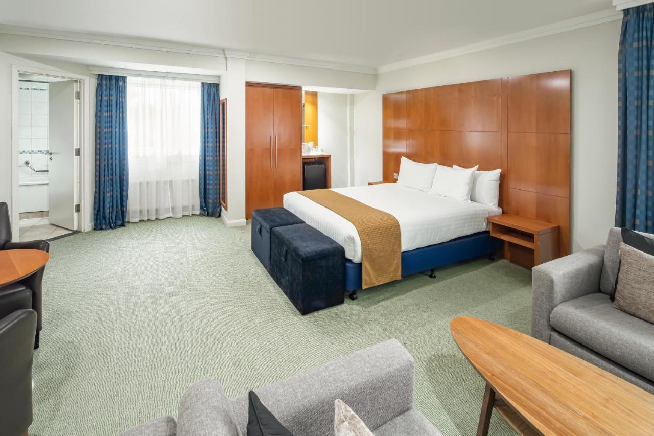 Standard Queen Room with One Queen and Two Sofa Beds