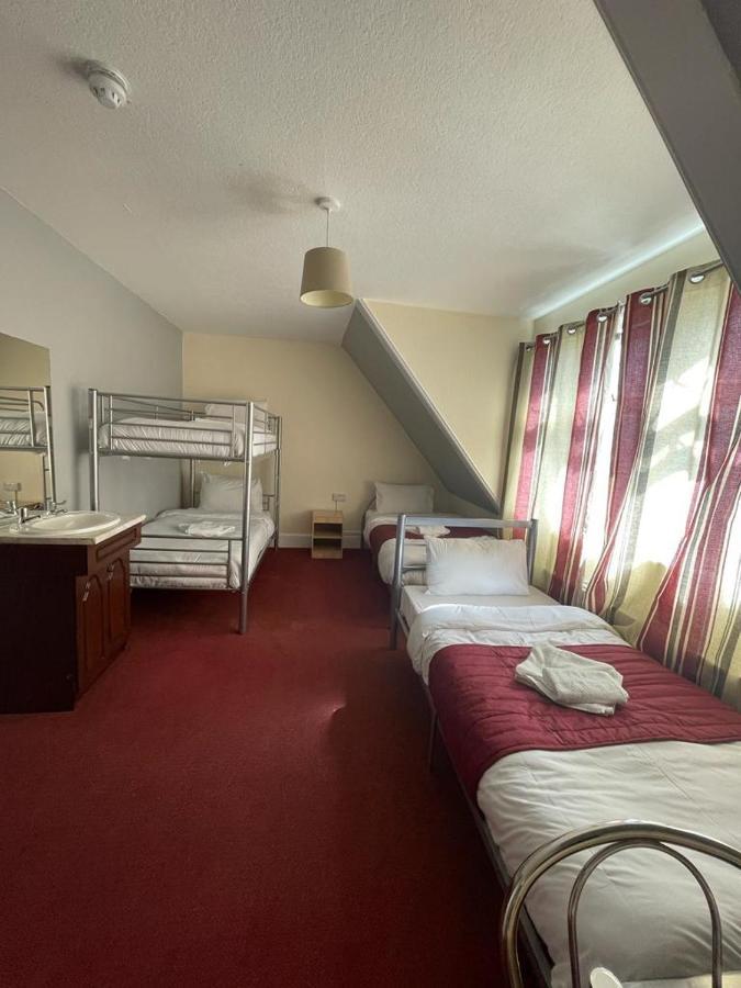 Quadruple Room with Shared Bathroom