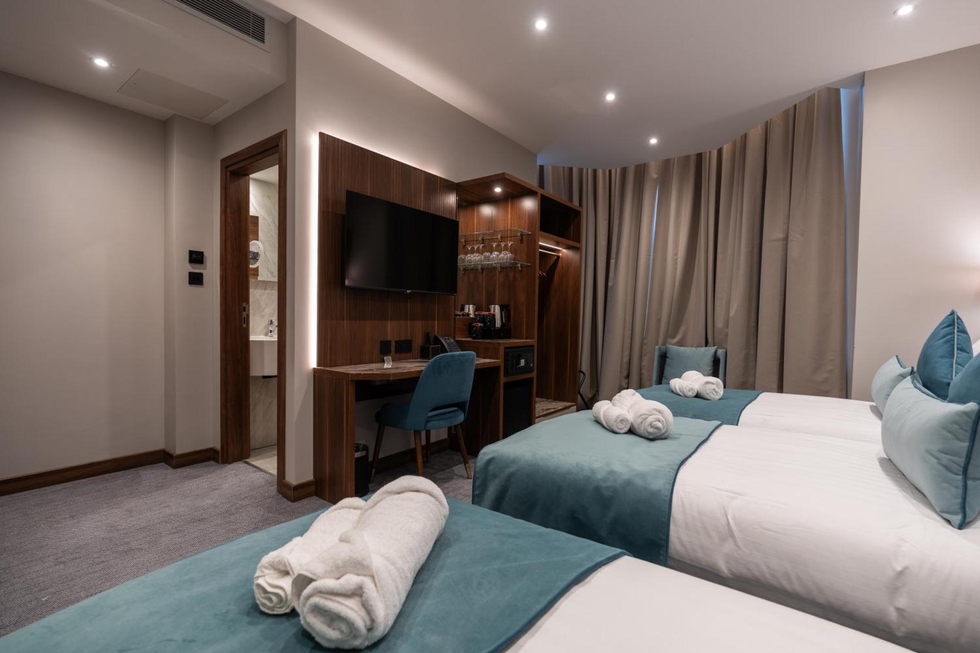 Deluxe Triple Room